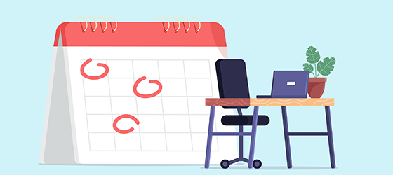 Calendar with dates circled and an empty work desk.